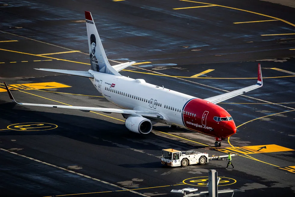 Norwegian-fly på Oslo lufthavn. Danske Bank tror selskapet holder seg i luften.