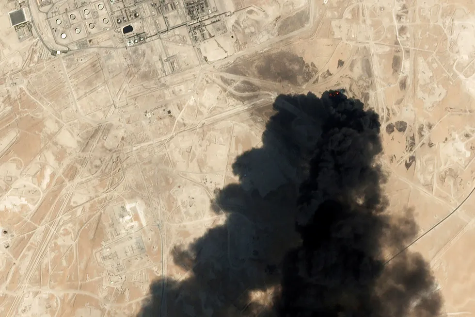 This Saturday, Sept. 14, 2019, satellite image from Planet Labs Inc., shows thick black smoke rising from Saudi Aramco's Abqaiq oil processing facility in Saudi Arabia