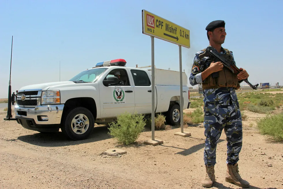 On guard: Iraqi security forces at the West Qurna 2 oilfield