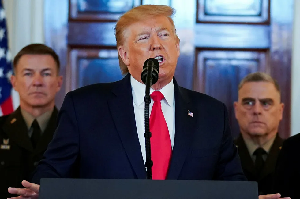 Iran update: US President Donald Trump delivers a statement about Iran on 8 January 2020 as US Army Chief of Staff General James McConville and Chairman of the Joint Chiefs of Staff Army General Mark Milley listen in
