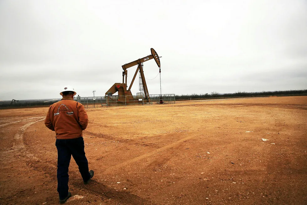 Oil down near $73 on US stocks, Opec supply