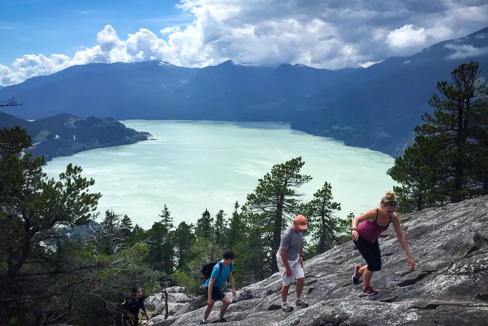Climbing: walkers on a rock face above Squamish in British Columbia, Canada, home to the Woodfibre LNG project