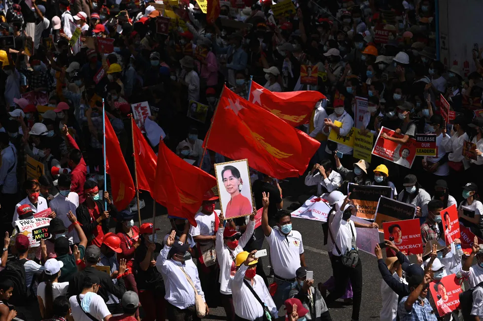 Myanmar unrest: protesters block a major road during a demonstration against the military coup in Yangon on 17 February
