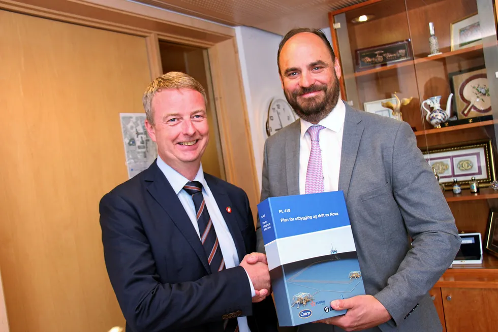 Balanced agreement: Norwegian Energy Minister Terje Soviknes (left) receives the Nova devlopment plan from Wintershall Norway managing director Hugo Dijkgraaf