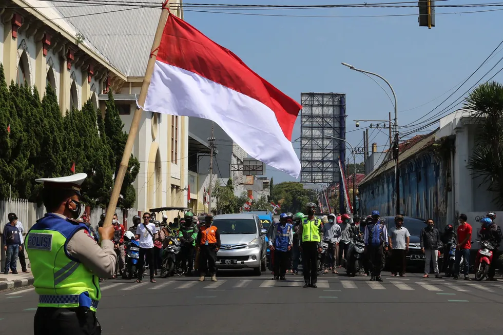 Flag day: the Indonesian flag is waved to mark Independence Day