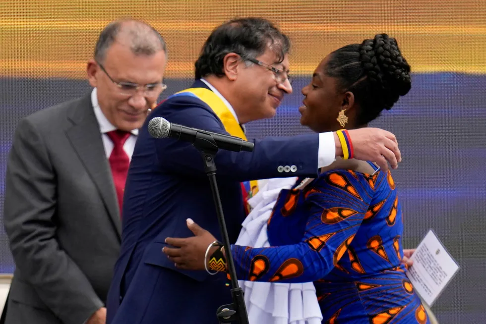 Embrace change: Colombia’s President Gustavo Petro (centre) embraces Vice-President Francia Marquez after she took her oath of office in Bogota.