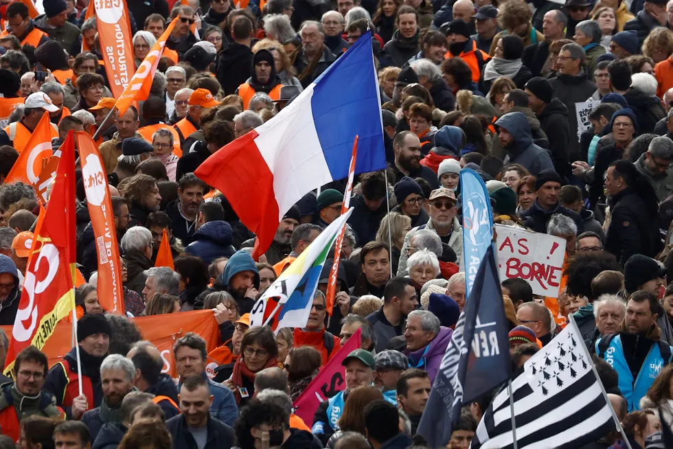Supply risk: Demonstrators wave flags during protests against French government’s pension reform in Nantes.