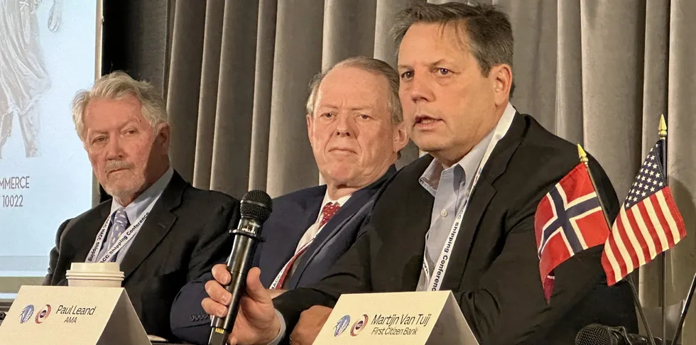 AMA Capital Partners chief Paul Leand (right) speaks at the HACC-NACC conference, as Morten Arntzen of Macquarie Bank (left) and Martin Lunder of Green Harbour Advisors look on.