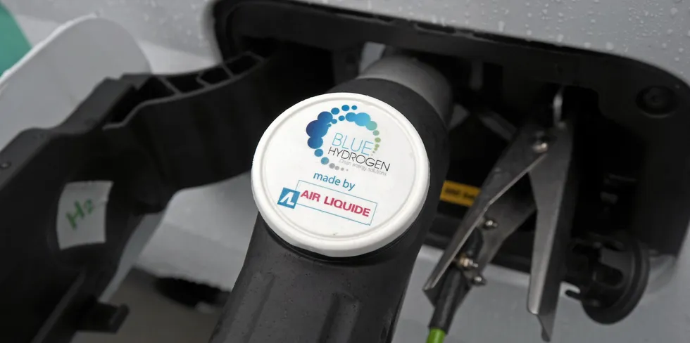 'Blue hydrogen' is pumped into a fuel-cell electric vehicle at a petrol station in France.