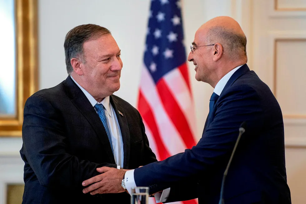 Potential: US Secretary of State Mike Pompeo, left, and Greek Foreign Minister Nikos Dendias shake hands after their meeting at the Foreign Ministry in Athens