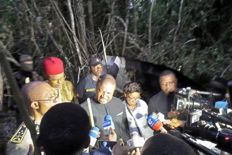 On site: Cameroon's Minister of Transport Jean Ernest Bibehe responds to reporters questions at the aircraft crash site