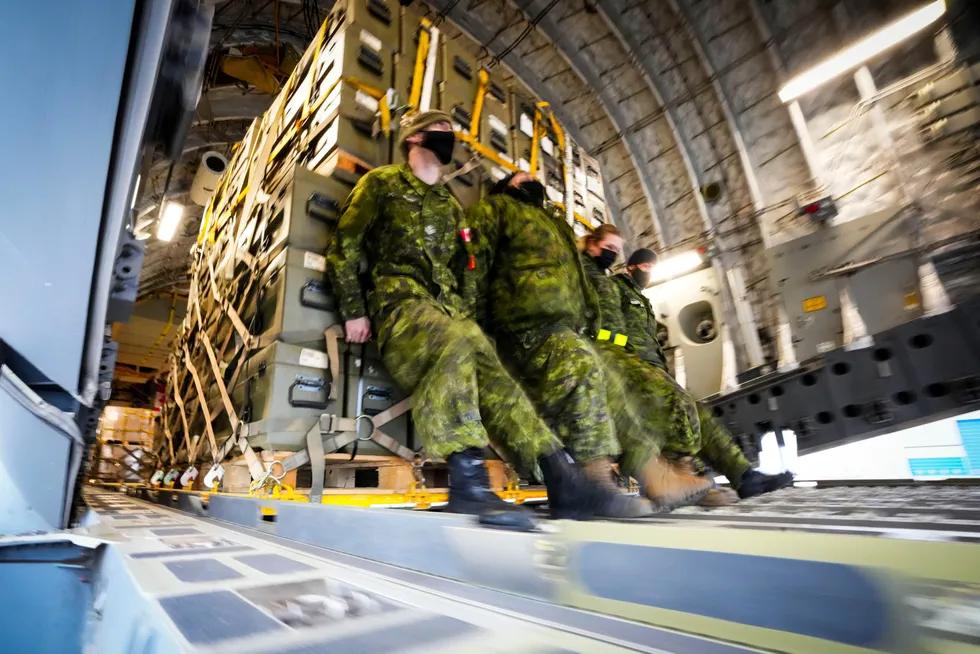 Joint effort: Royal Canadian Air Force personnel load military aid for Ukraine at the Canadian Forces Base in Trenton, Ontario