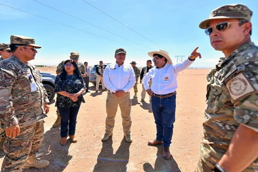 . Peruvian defence minister Walter Astudillo (centre) talks to Arequipa regional governor Rohel Sánchez Sánchez (pointing) at the project site on Monday.