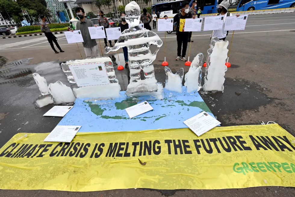 Activists from Greenpeace Indonesia: the republic is one of many Asian nations seeking international support for its climate change battle