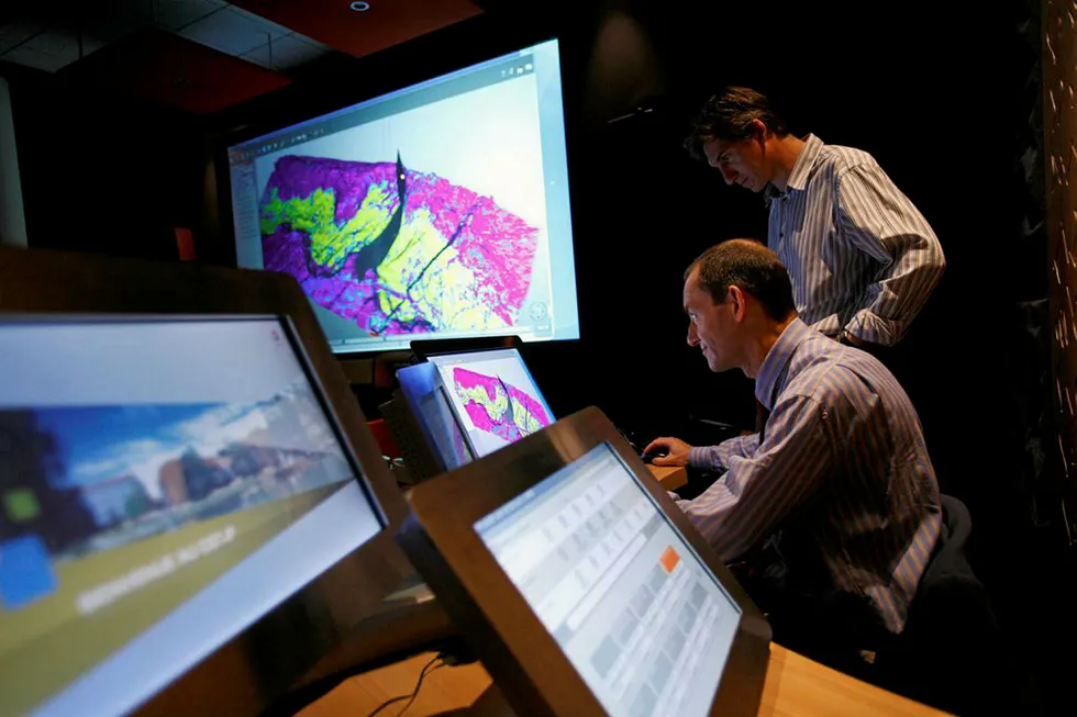 Data-driven: technicians working with reservoir data at Total's R&D hub in Pau, France
