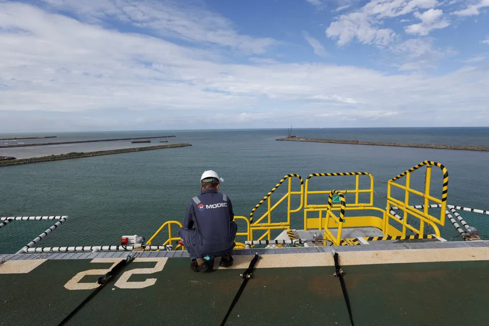 In the office: a Modec employee on the Anita Garibaldi floating production, storage and offloading vessel at a shipyard in Aracruz, Espirito Santo state, Brazil.