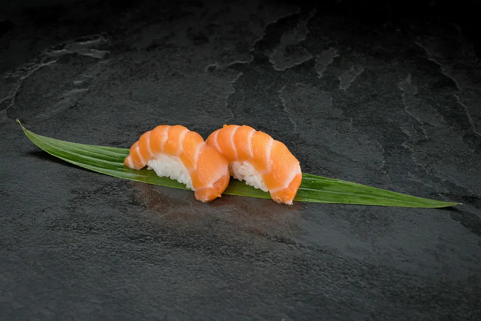 Less demand for sushi means that the prices of large salmon are being pushed down.