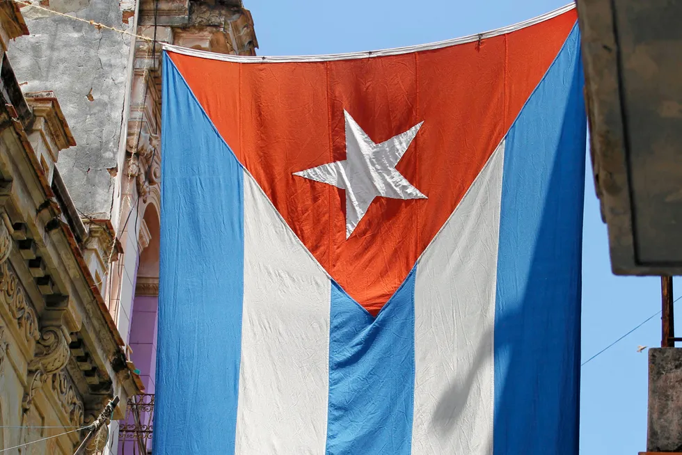New campaign: a Cuban national flag hangs from balconies in a Havana street