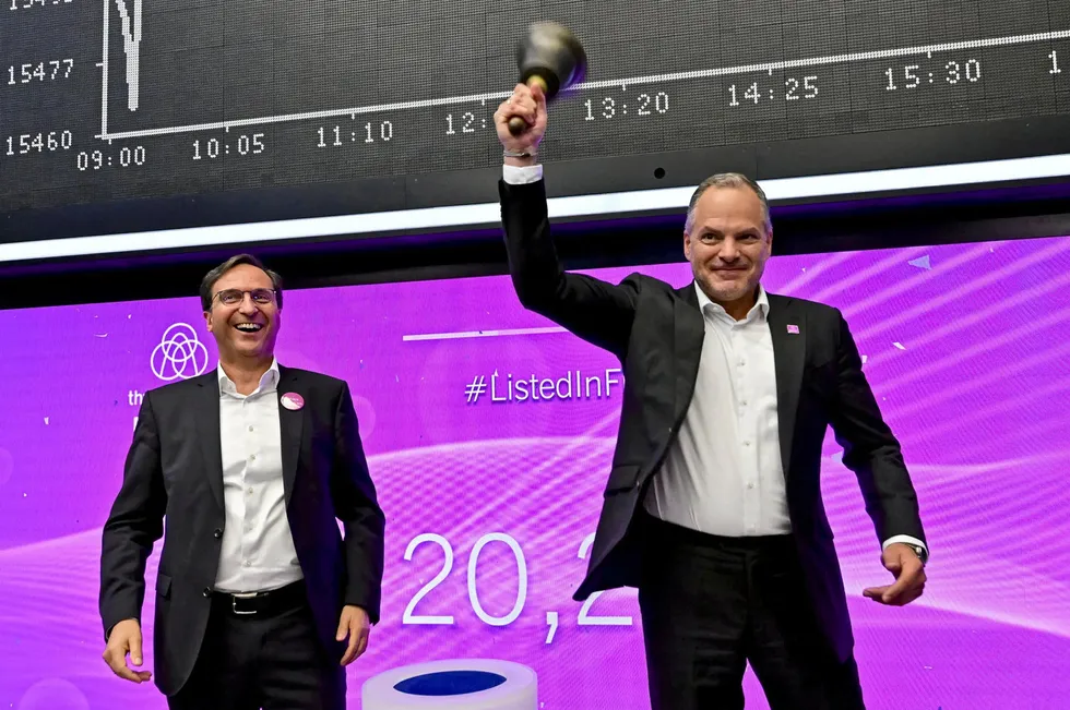 Thyssenkrupp Nucera CEO Werner Ponikwar rings the bell at the Frankfurt Stock Exchange on the occasion of its share listing last year, watched by chief financial officer Arno Pfannschmidt.