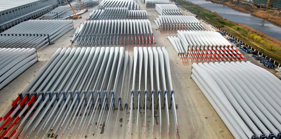 Wind turbine blades stacked at a factory in China. Recycling and disposal is a major problem for the industry.