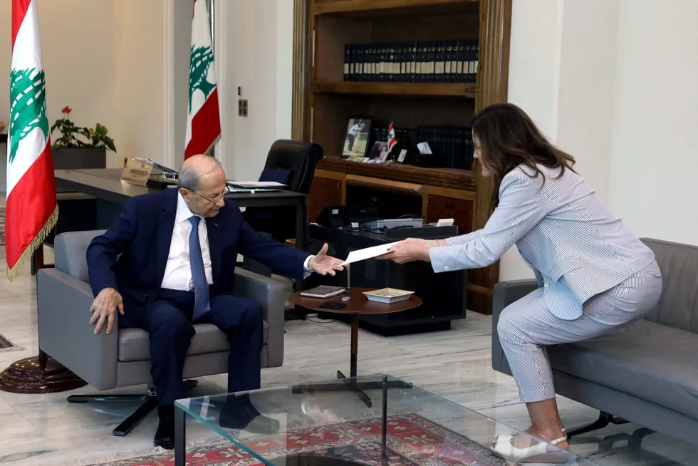 Positive sign: Lebanon’s President Michel Aoun is handed details on the draft maritime boundrary deal by the US Ambassador to Lebanon Dorothy Shea on 1 October.