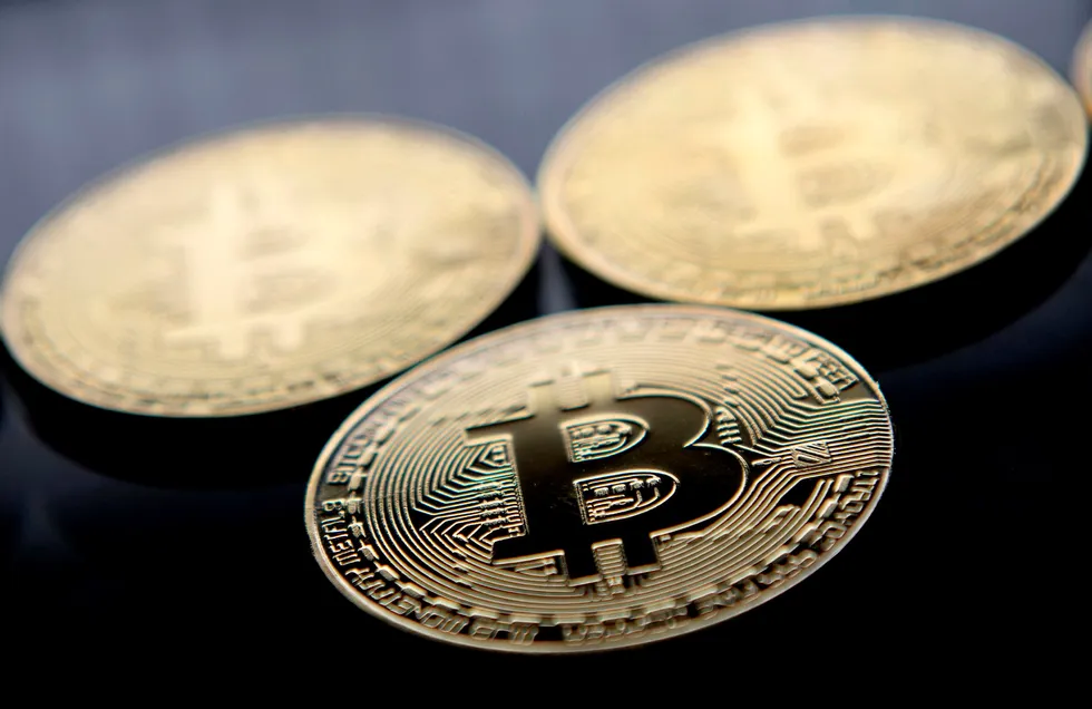 Bitcoin og annen kryptovaluta er skattepliktig. DNs kalkulator for skatt av kryptovaluta hjelper deg med utfyllingen. Foto: JUSTIN TALLIS/AFP/NTB scanpix