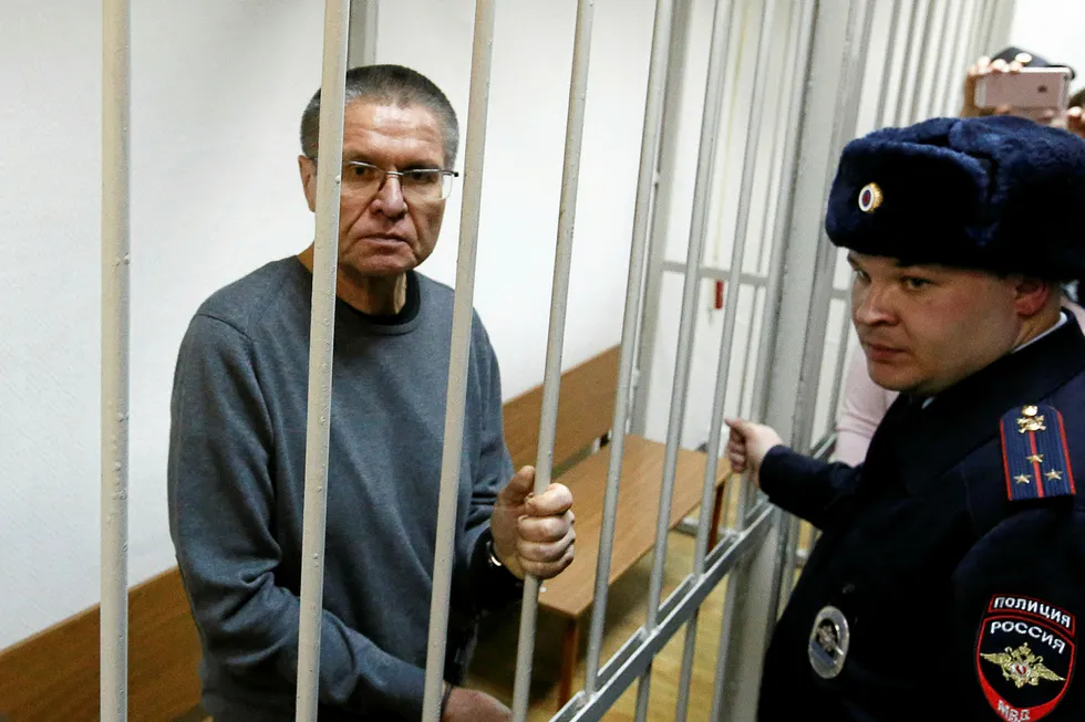 Behind bars: Russian former economy minister Alexei Ulyukayev stands behind bars after the verdict at a courtroom in Moscow
