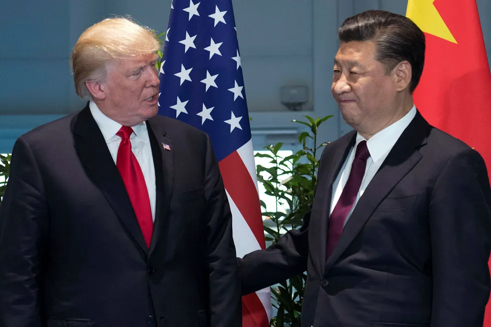 Fra et møte mellom USAs president Donald Trump og Kinas president Xi Jinping under G20-toppmøtet i Hamburg i begynnelsen av juli i år. Foto: Saul Loeb / AP / NTB Scanpix