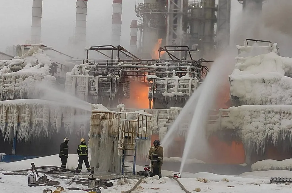 Interruptions: Firefighters work to extinguish fire at gas condensate processing facilities in Ust-Luga in Russia that are operated by country's gas producer Novatek.