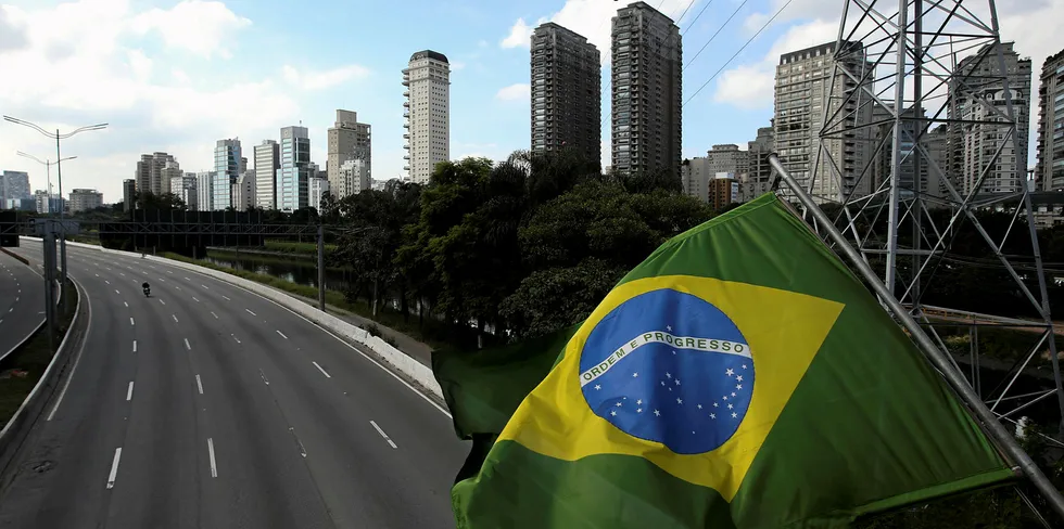 A Brazilian flag waving in an empty Marginal Pinheiros during the coronavirus (COVID-19) pandemic.