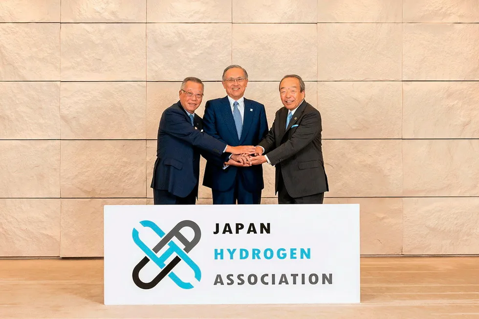 (L-R) Iwatani CEO and chairman Akiji Makino, Sumitomo Mitsui Financial Group chairman Takeshi Kunibe, and Takeshi Uchiyamada, an executive fellow at Toyota.