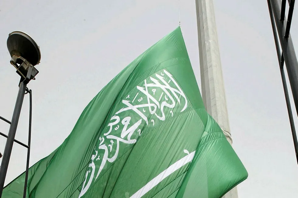 Location: a Saudi Arabian flag in the city of Dammam, where McDermott's fabrication facility is located. AFP PHOTO/STR