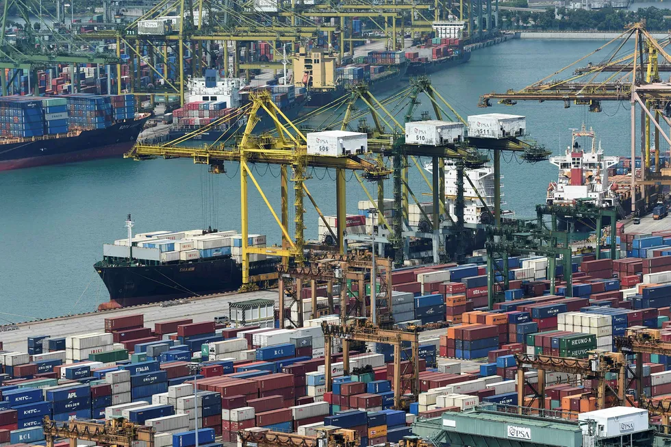 Singapore er blitt en global handelsnasjon på 50 år. En handelskrig mellom Kina og USA han ramme landet hardt. Foto: Roslan Rahman/AFP/NTB Scanpix
