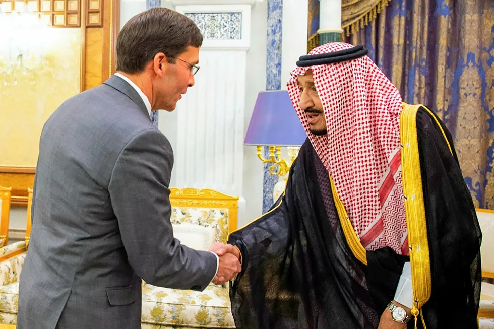 A handout picture provided by the Saudi Press Agency (SPA) on October 22, 2019 shows King Salman bin Abdulaziz (R) shaking hands with US Defense Secretary Mark Esper in the capital Riyadh. (Photo by - / SPA / AFP) / === RESTRICTED TO EDITORIAL USE - MANDATORY CREDIT "AFP PHOTO / HO / SPA" - NO MARKETING NO ADVERTISING CAMPAIGNS - DISTRIBUTED AS A SERVICE TO CLIENTS ===