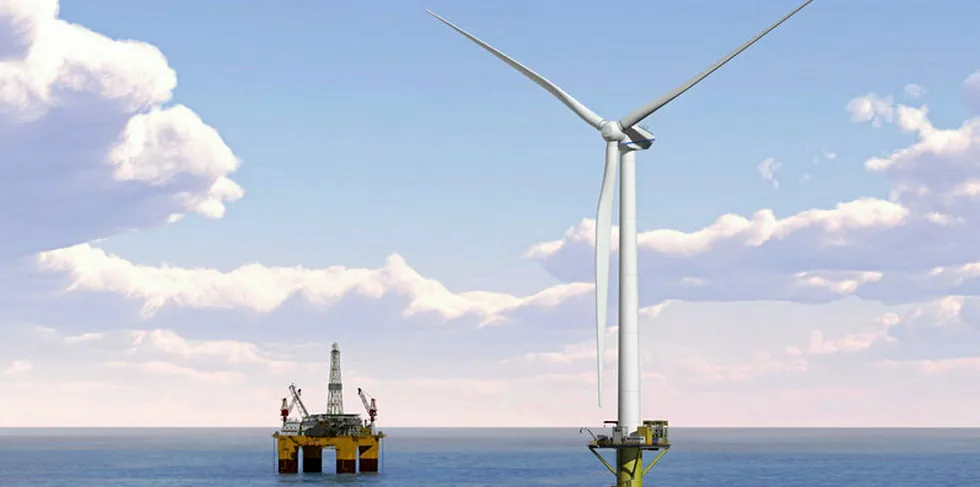Offshore wind turbine and drill rig in North Sea