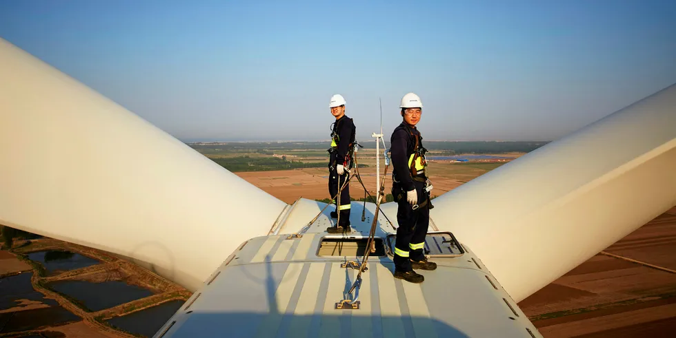 Vestas turbine with Chinese workers