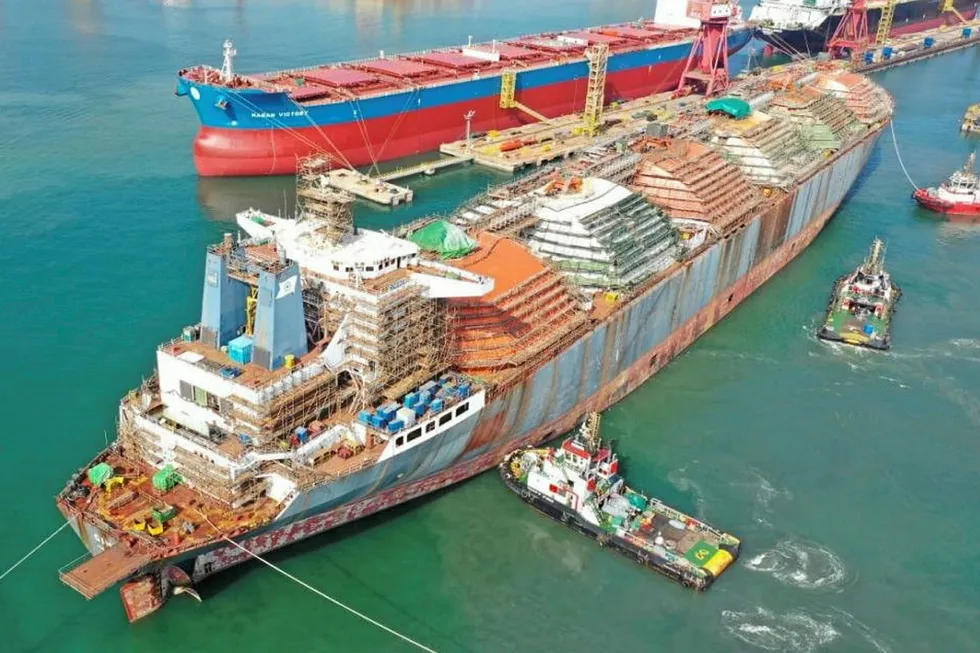 Under conversion: work being carried out on the Gimi FLNG vessel in Singapore