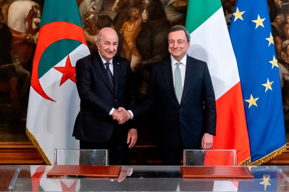 Agreement: Algerian President Abdelmadjid Tebboune (left) shakes hands with Italian Prime Minister Mario Draghi at Rome's Palazzo Chigi as a gas and hydrogen deal was signed