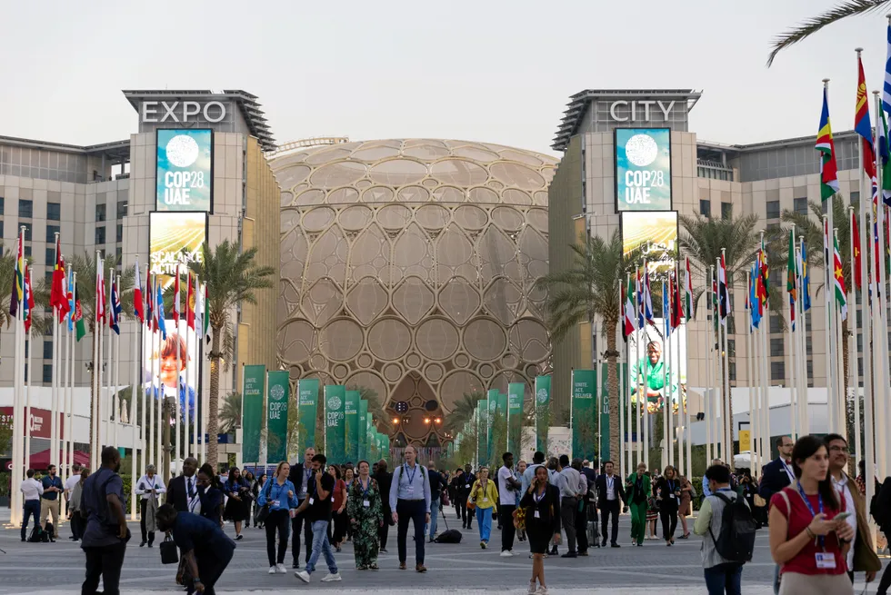 Attendees outside Expo City Dubai during COP28.