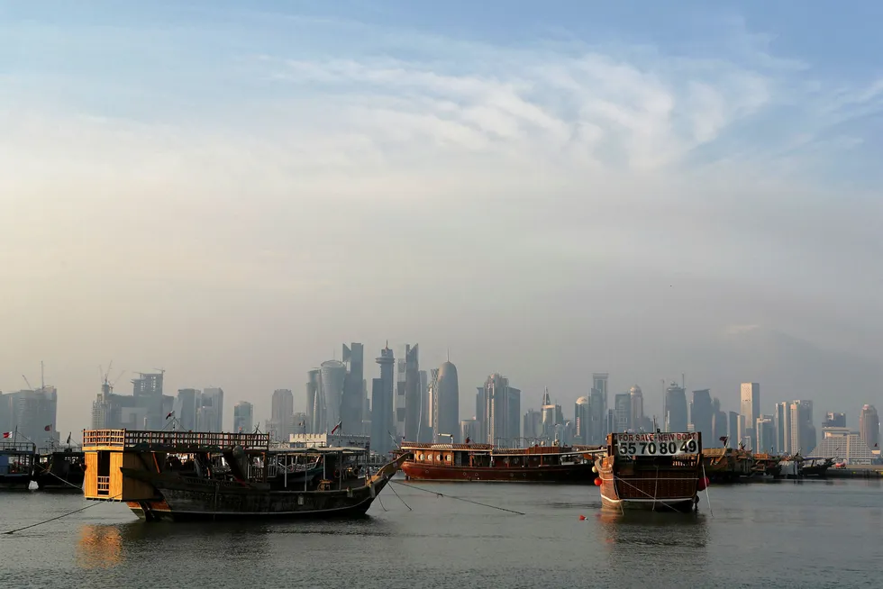 On the fast track: boats moored in front of the skyline of the Qatari capital, Doha