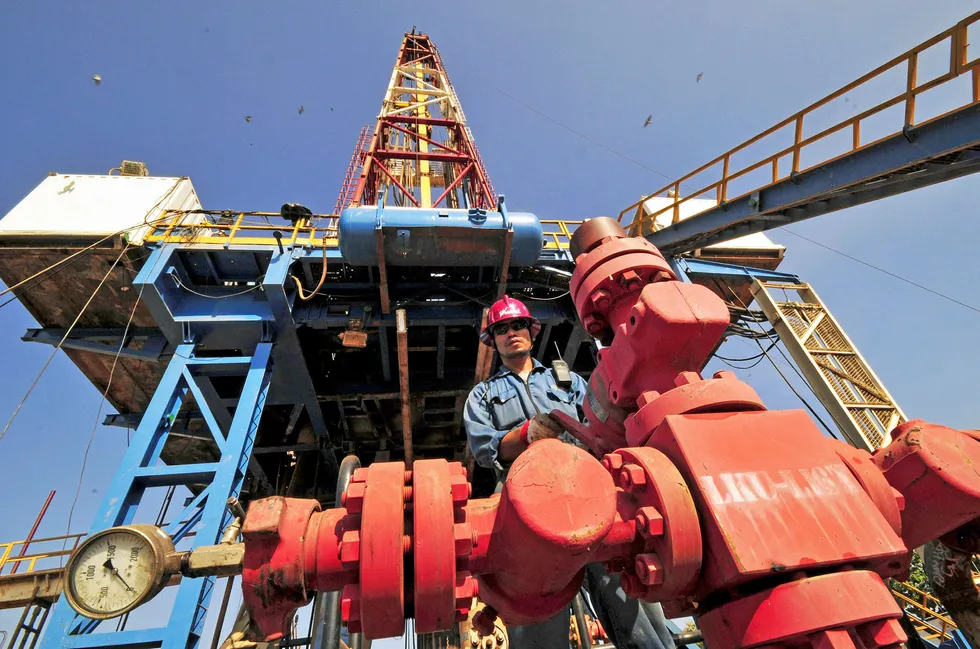 Rig ready: a worker at a PTTEP drill site in Thailand