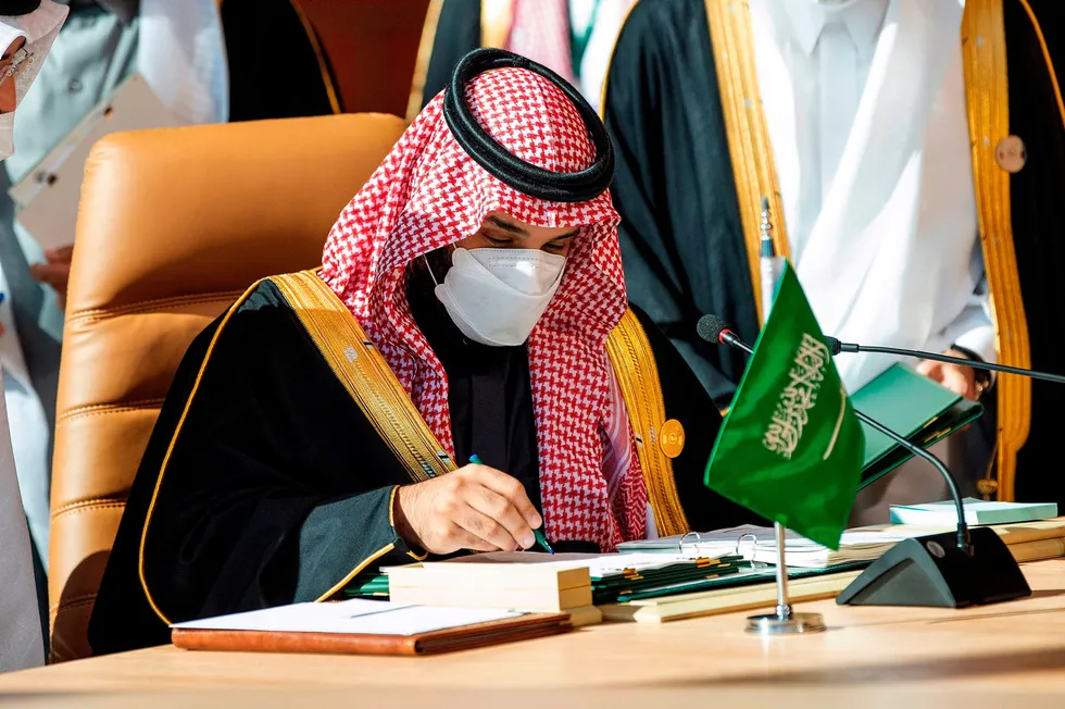 Signing: Crown Prince Mohammed bin Salman signing a document during the opening session of the 41st Gulf Cooperation Council summit in the north-western Saudi city of al-Ula