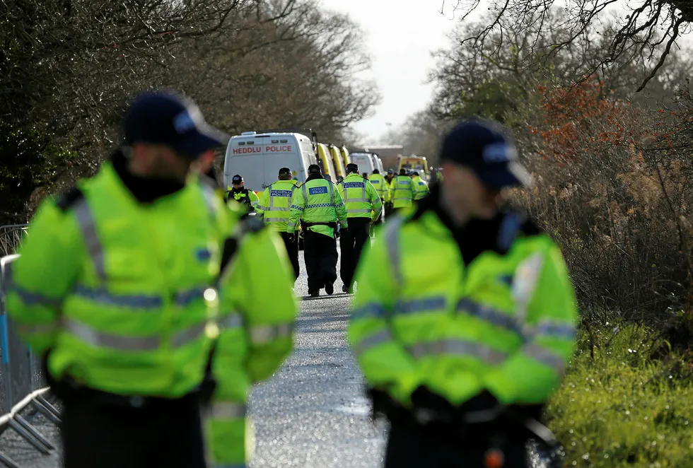 On the job: Police at an anti-fracking protest site in the UK