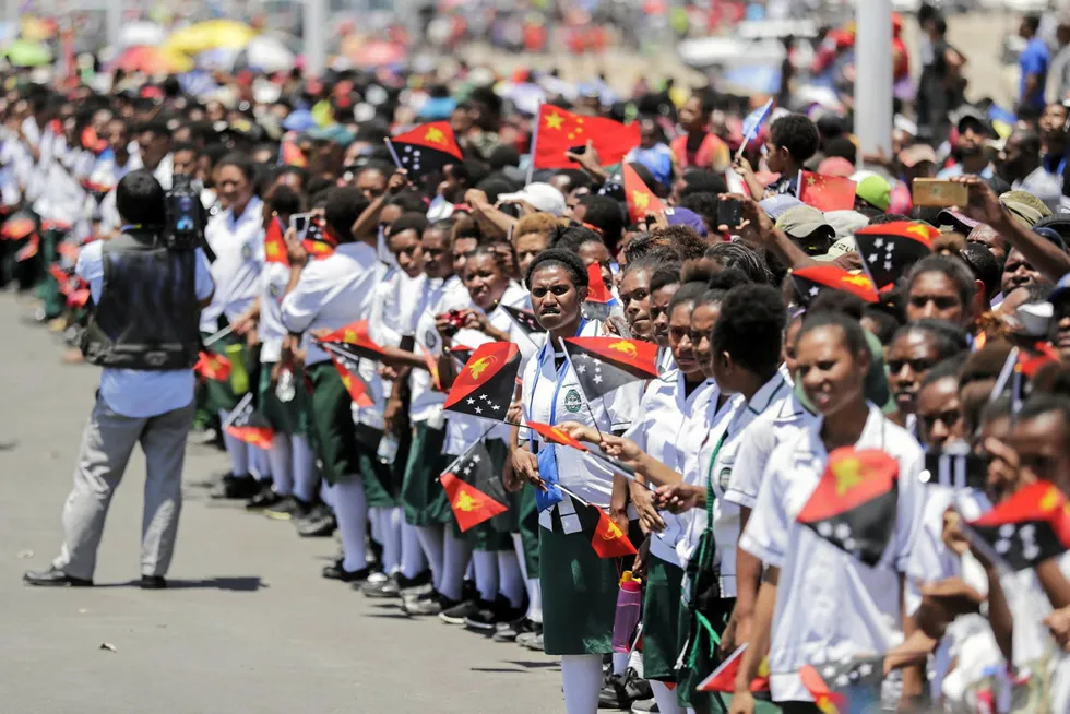 Wait nearly over: school children in Port Moresby, Papua New Guinea