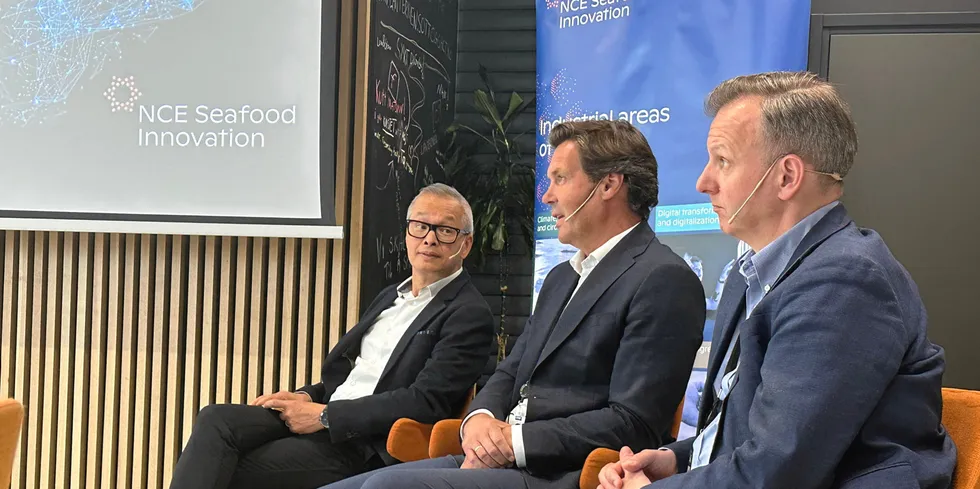 Leroy CEO Henning Beltestad, center, believes by sharing data, the salmon industry would improve fish health, decrease mortalities and ultimately see companies make more profit.
