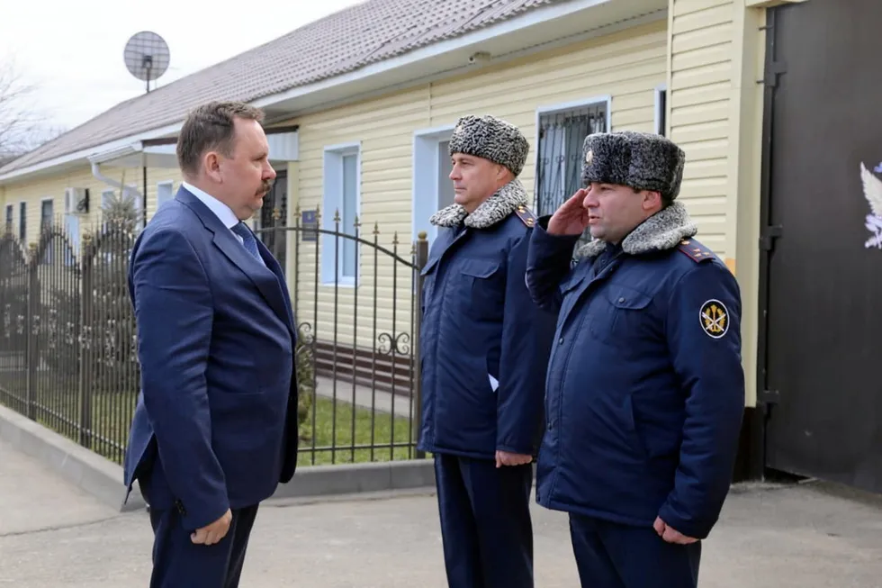 Jobs proposal: head of Russian Penitentiary Service Alexander Kalashnikov (left) arriving to inspect labour prison conditions in the Stavropol region