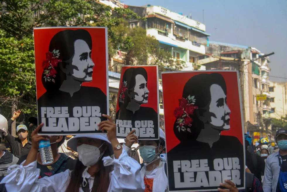 Protests: anti-coup protesters display pictures of deposed Myanmar leader Aung San Suu Kyi in Yangon, Myanmar on 2 March, 2021