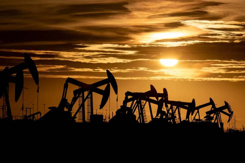 Pumped up: pump jacks operate in a Midland, Texas oilfield. Energy companies spent the first quarter of 2021 recharging after a draining pandemic year