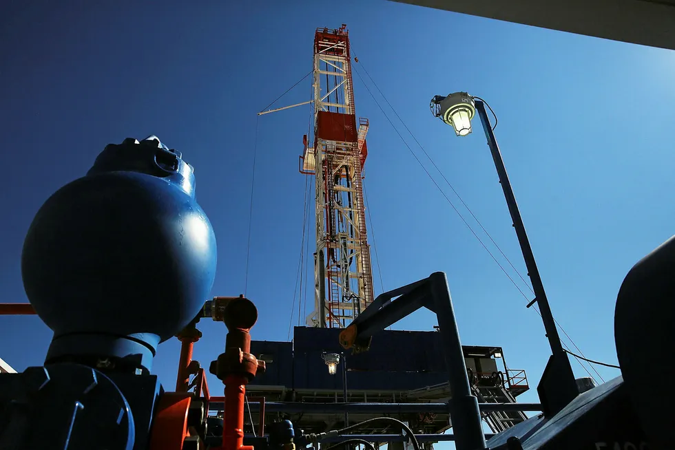 On site: a drilling rig at shale asset