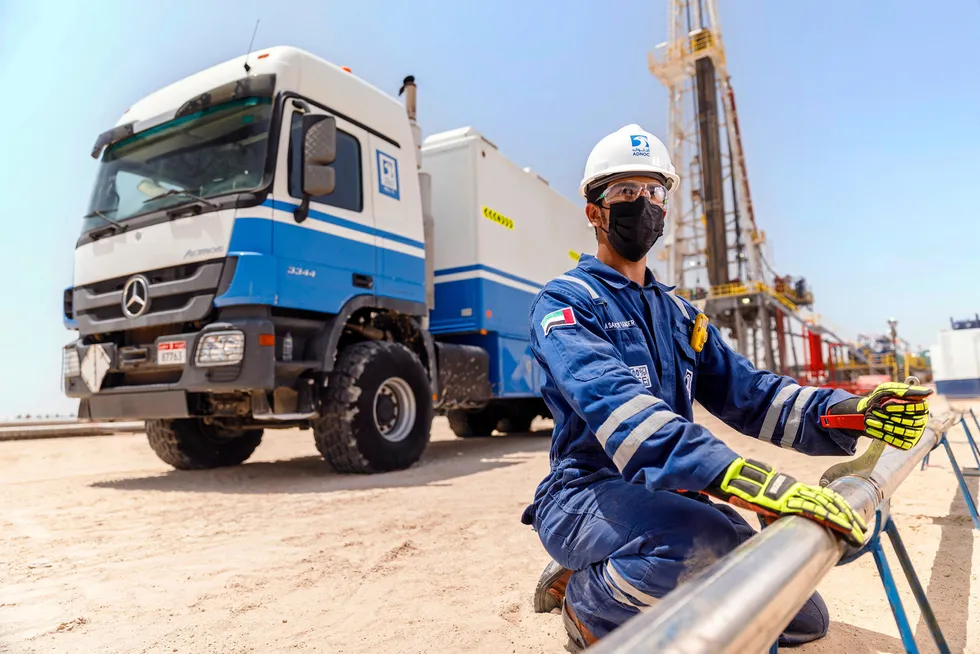Raising the bar: an Adnoc Drilling employee at a drilling operation in Abu Dhabi
